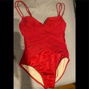 Magicsuit Slimming One piece bathing suit . Bra is underwire. Size 10.